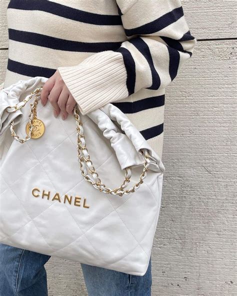 chanel white knotted purse|Chanel 22 bag small price.